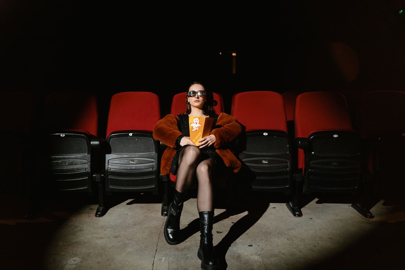Guest enjoying popcorn at the cinema