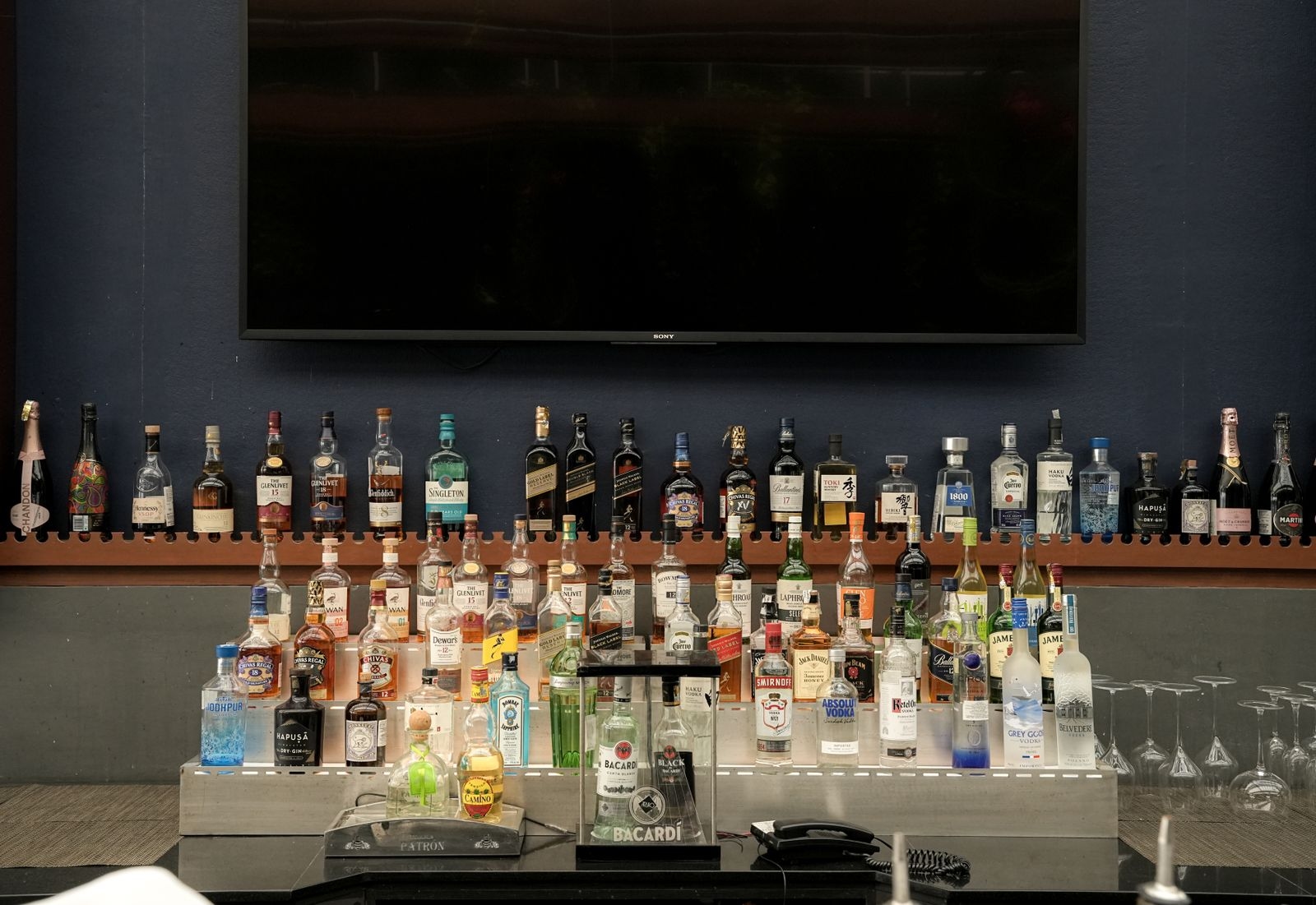 Backlit bar shelf with spirits